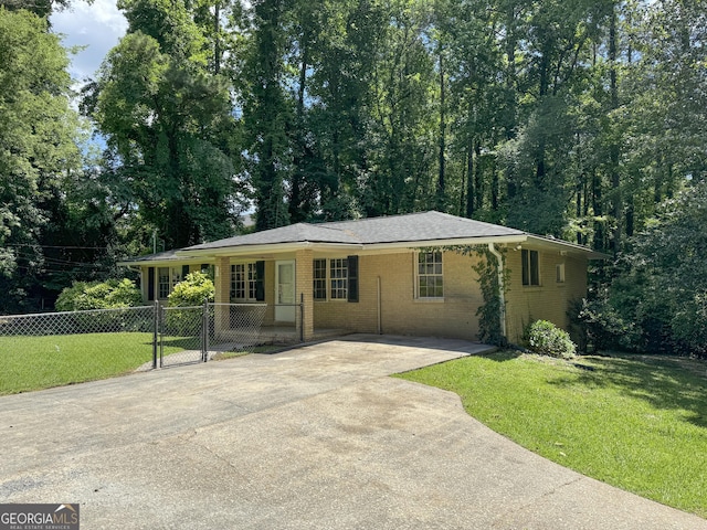 ranch-style house with a front lawn