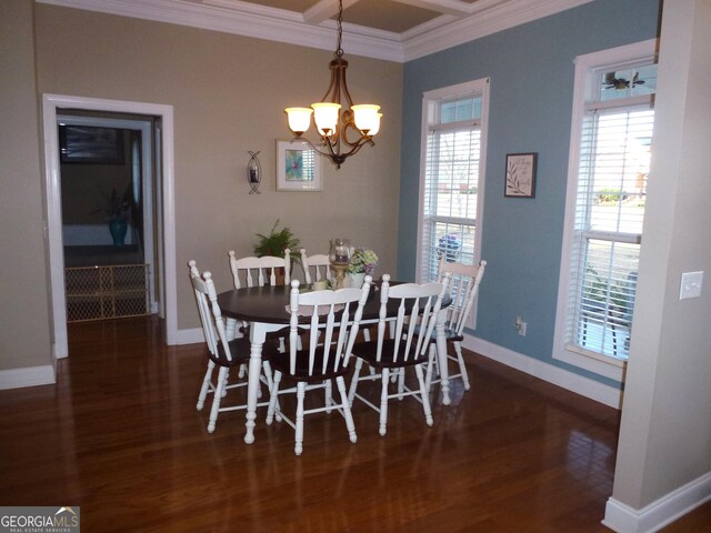 dining room featuring an inviting chandelier, ornamental molding, and dark hardwood / wood-style floors