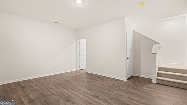 interior space with dark hardwood / wood-style flooring