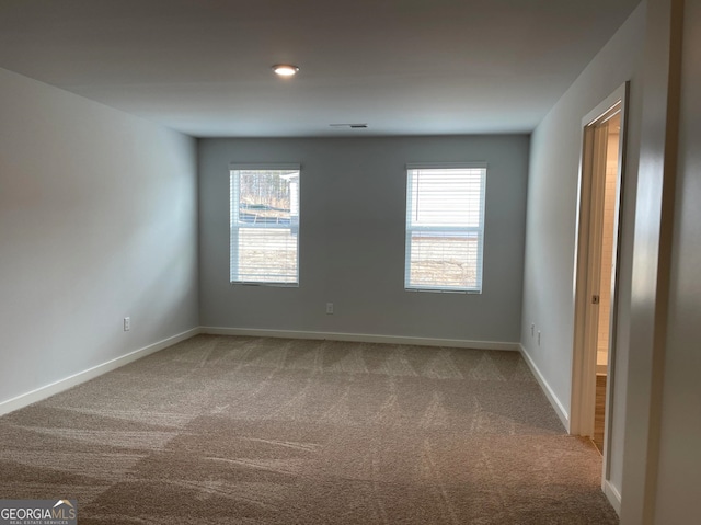 view of carpeted spare room