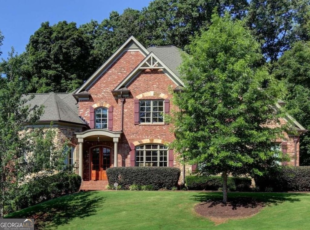 view of front of home with a front yard