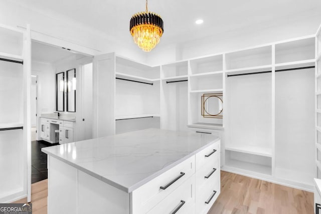 walk in closet featuring light wood-type flooring