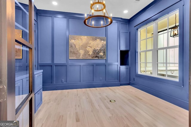 unfurnished room featuring light wood-type flooring