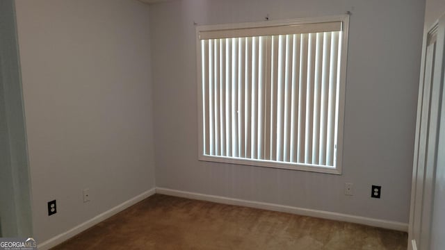 view of carpeted spare room