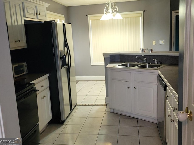 kitchen with white cabinetry, black / electric stove, pendant lighting, sink, and light tile flooring