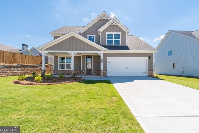 craftsman-style home featuring a front yard and a porch