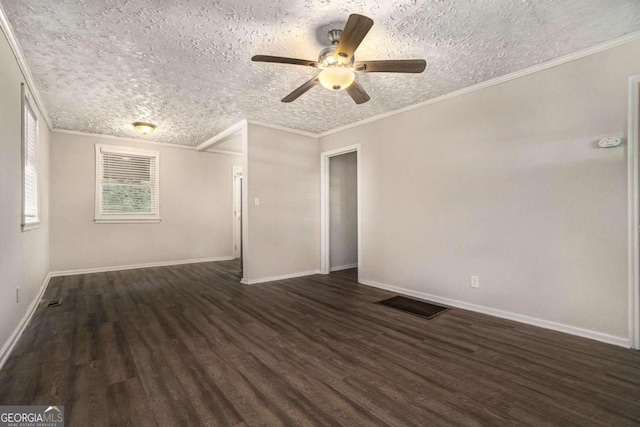 unfurnished room with dark hardwood / wood-style floors, crown molding, and a textured ceiling