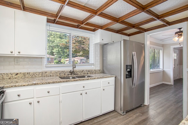 kitchen featuring white cabinetry, sink, coffered ceiling, stainless steel fridge with ice dispenser, and light hardwood / wood-style floors