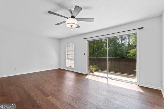 unfurnished room with wood-type flooring and ceiling fan