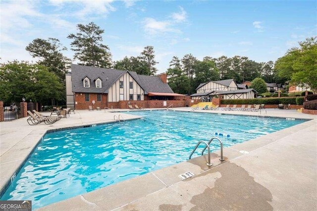 view of pool with a patio area