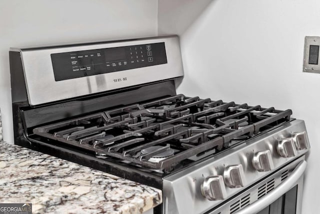 interior details featuring stainless steel range with gas cooktop