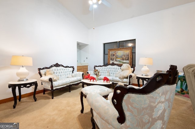 living room with light carpet, high vaulted ceiling, and ceiling fan