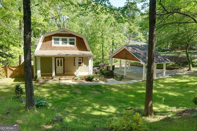 view of front of home with a front lawn and covered porch