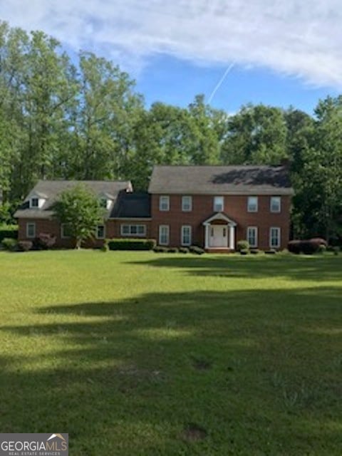 view of front of house with a front yard