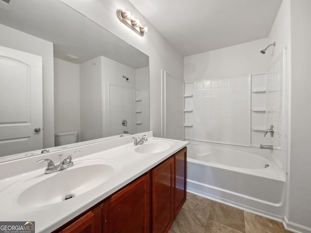 full bathroom with shower / bathing tub combination, vanity, toilet, and tile patterned flooring