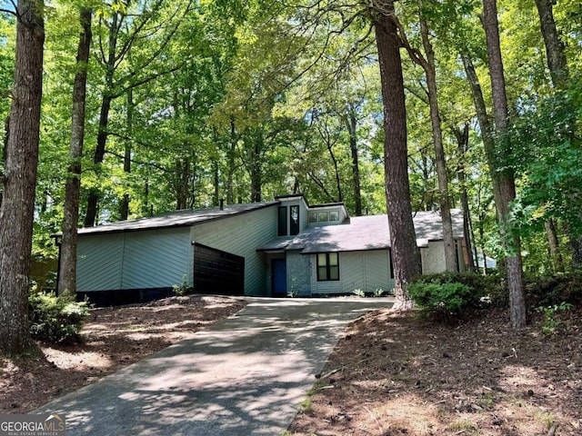 single story home featuring a garage