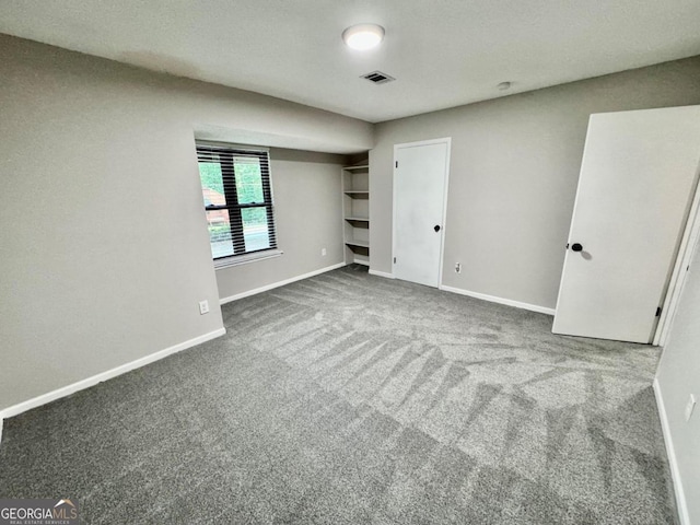 unfurnished bedroom featuring carpet flooring