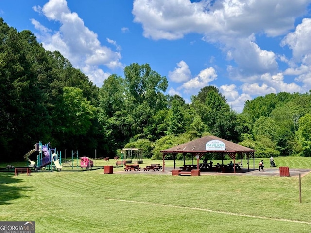 view of community with a gazebo, a yard, and a playground