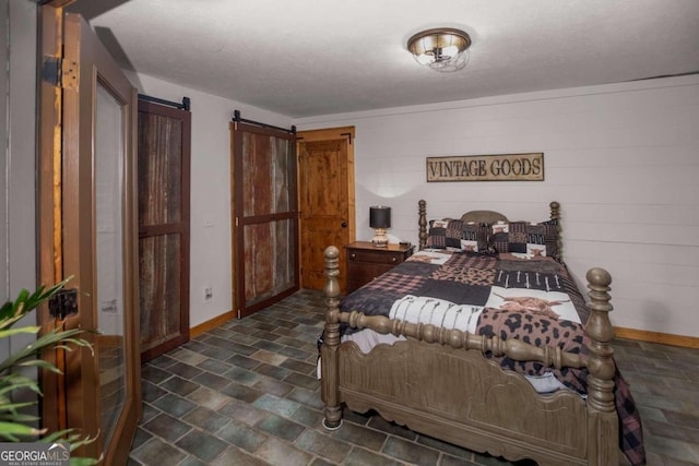 bedroom with a barn door