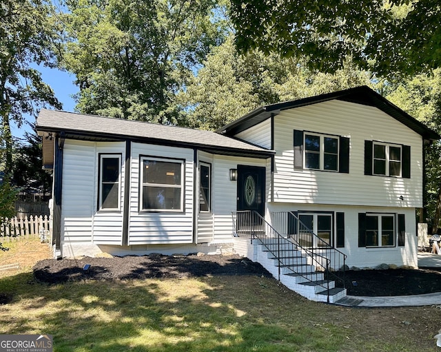 split level home with a front yard