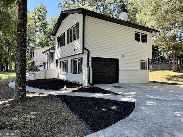 view of home's exterior featuring a garage