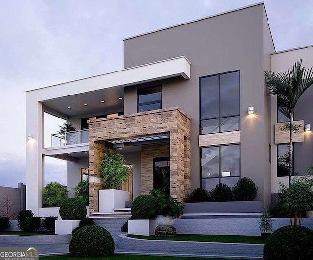 contemporary house featuring a balcony