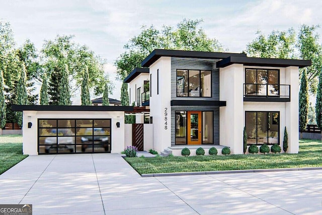 contemporary home with french doors, a garage, and a front lawn