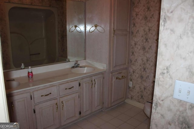 bathroom featuring vanity and tile patterned flooring