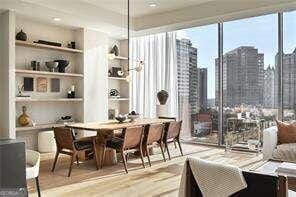 bar featuring built in shelves and light hardwood / wood-style floors