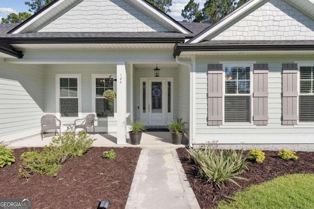 property entrance featuring a porch