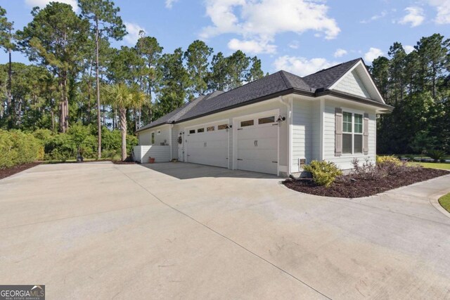 view of home's exterior with a garage