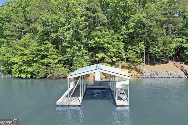 view of dock with a water view