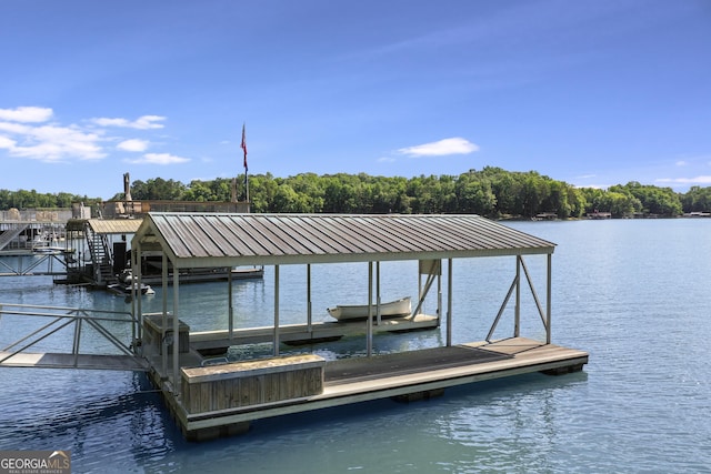 view of dock with a water view