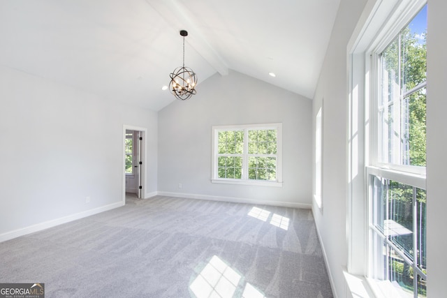 carpeted spare room with a notable chandelier and lofted ceiling with beams