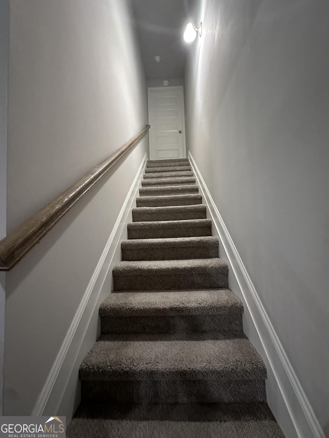 stairway with carpet floors