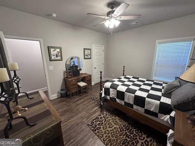 bedroom featuring ceiling fan and dark wood-type flooring