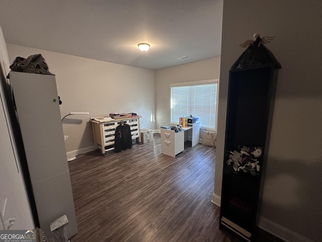 interior space featuring dark wood-type flooring