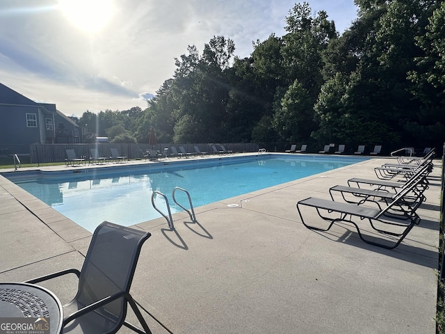 view of pool featuring a patio