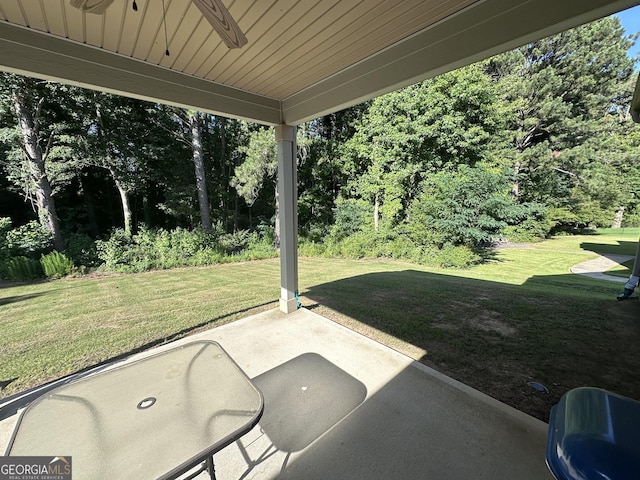 view of patio featuring ceiling fan