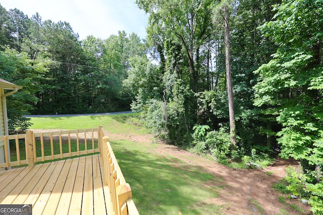 view of yard featuring a deck