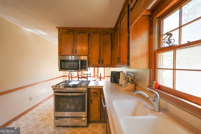 kitchen with sink and stainless steel appliances