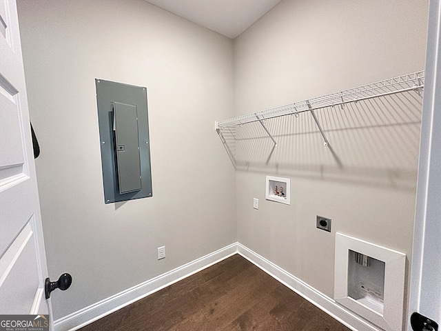 washroom featuring hookup for an electric dryer, washer hookup, electric panel, and dark wood-type flooring