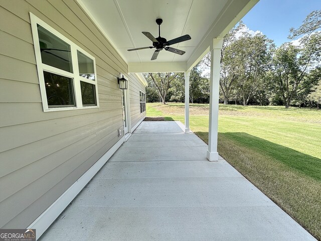 view of patio / terrace featuring ceiling fan