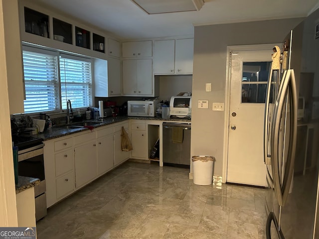 kitchen featuring white cabinetry, sink, dishwasher, and range with electric cooktop