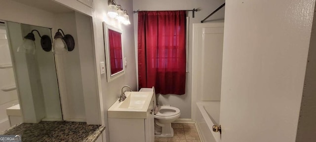 full bathroom with tile flooring, washtub / shower combination, oversized vanity, and toilet