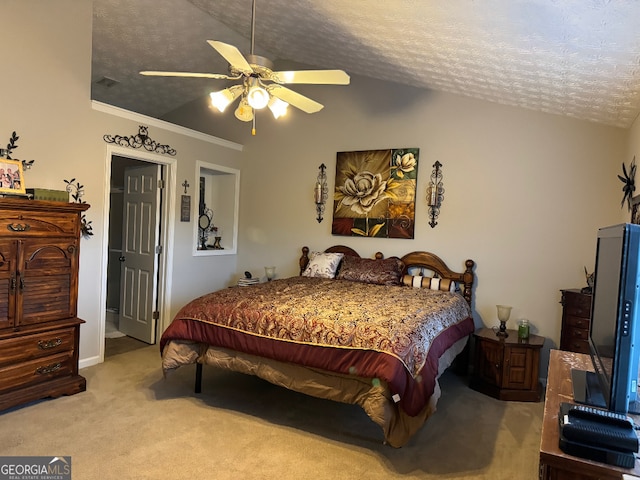 bedroom with ceiling fan, a textured ceiling, carpet flooring, and lofted ceiling