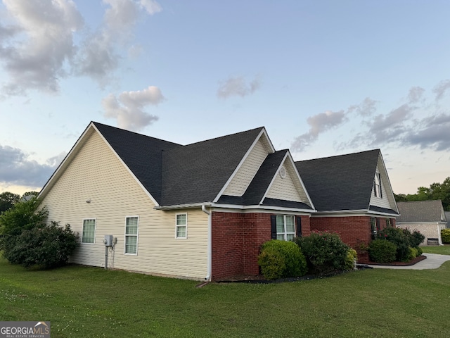 exterior space with a lawn