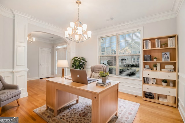 office area featuring crown molding, a notable chandelier, and light wood-type flooring