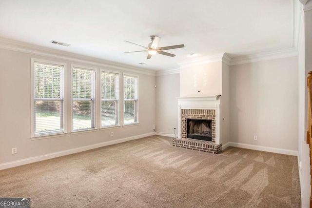 unfurnished living room with a fireplace, light colored carpet, and ornamental molding