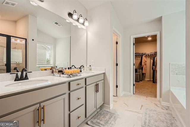 bathroom with separate shower and tub, vanity with extensive cabinet space, tile flooring, double sink, and lofted ceiling